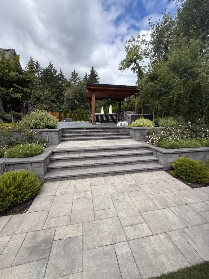 Multi-Tier Stone Paver Terraces and Cedar Living Retreat crafted by Rubi Construction in Hillsboro, Oregon